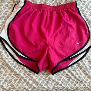Pink Nike shorts, woman’s medium